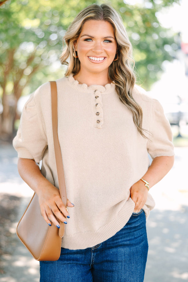 Plus size tan Sweater with short puff sleeves, ruffle neckline, and button details.