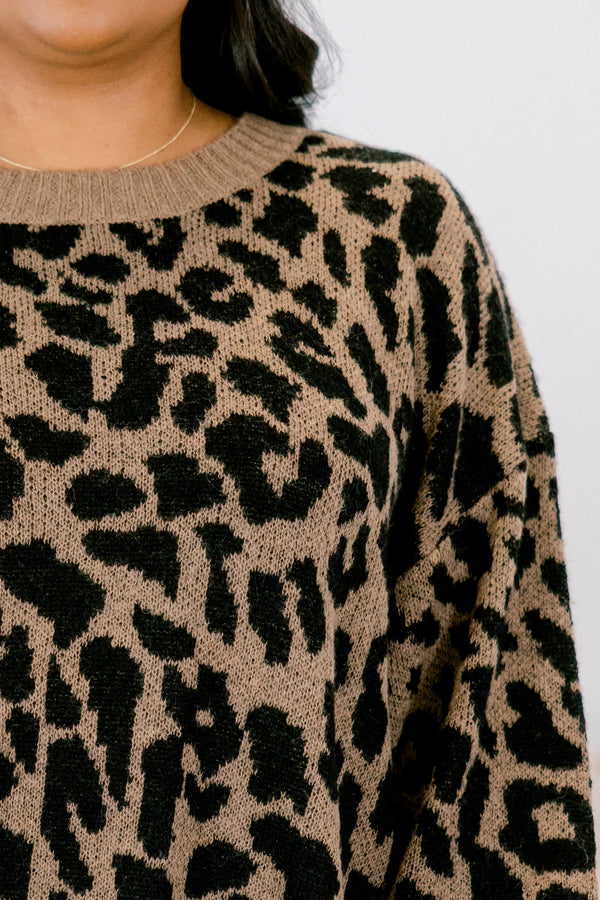 Plus Size brown leopard print knit sweater with balloon sleeves and ribbed trim.