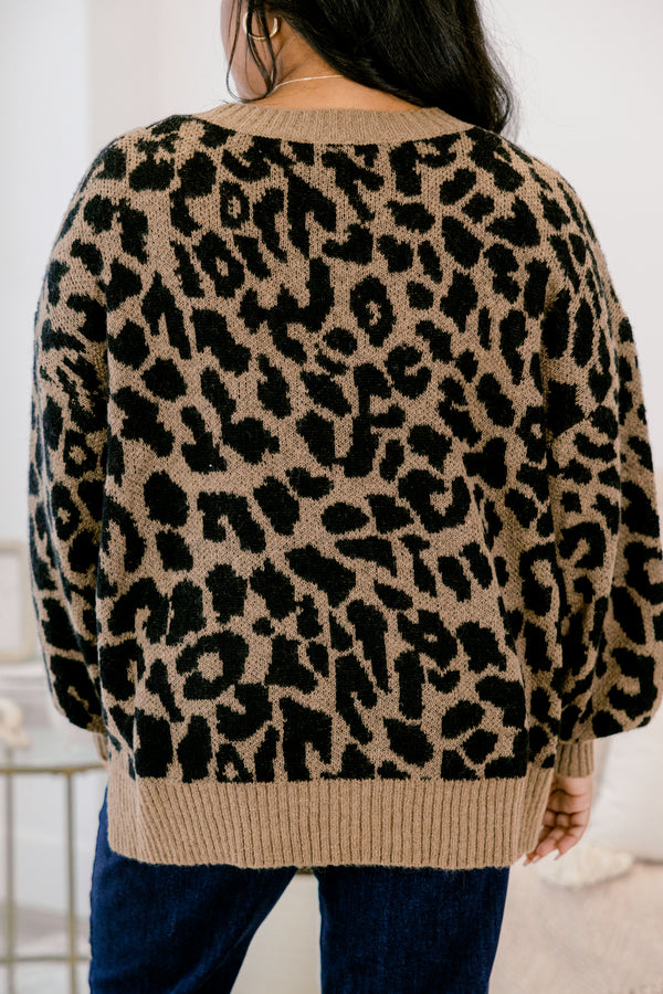 Plus Size brown leopard print knit sweater with balloon sleeves and ribbed trim.