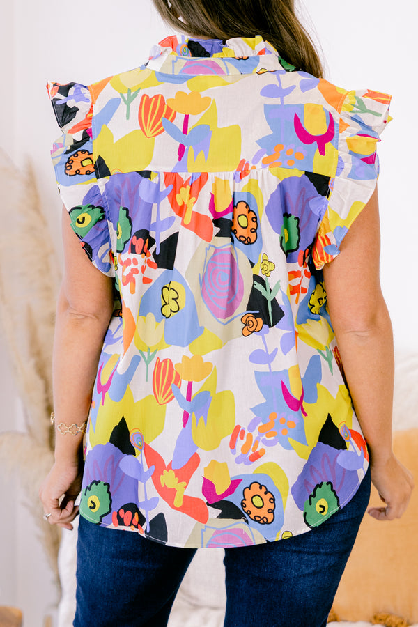 Chic Soul plus size clothing, white top with bold multicolor abstract pattern and flutter sleeves