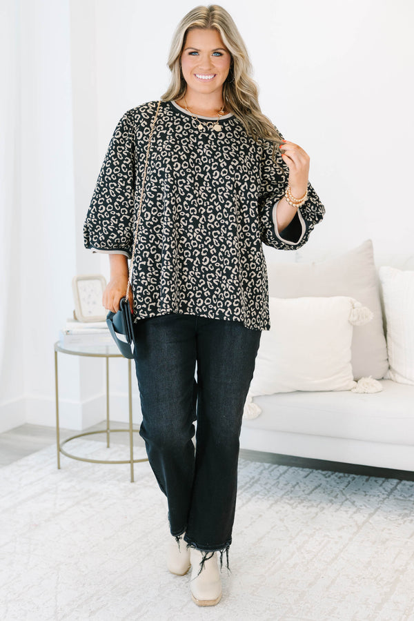 Plus Size leopard jacquard top with elastic puff sleeves, a crew neckline, and a relaxed fit.