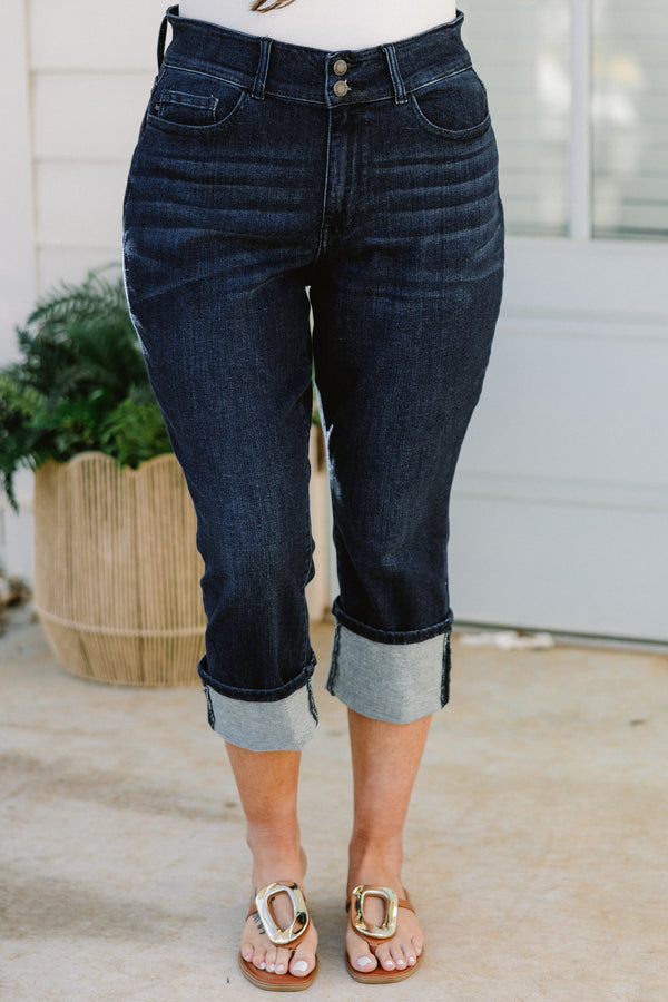 Chic Soul plus size clothing, mid-waisted dark-wash blue jean capris with a bronze button detailing and a cuffed bottom
