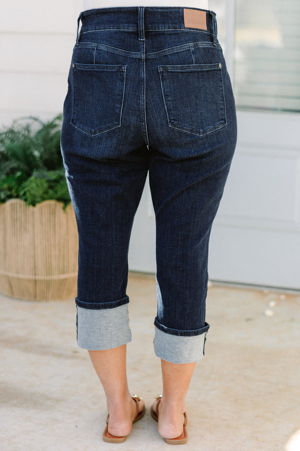 Chic Soul plus size clothing, mid-waisted dark-wash blue jean capris with a bronze button detailing and a cuffed bottom