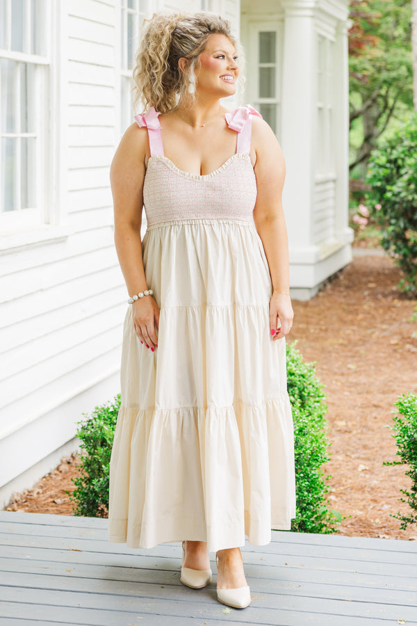 Chic Soul plus size clothing,  cream maxi dress with ruffles and pink ribbon ties on the shoulders 