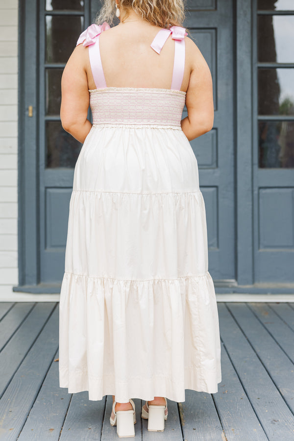 Chic Soul plus size clothing,  cream maxi dress with ruffles and pink ribbon ties on the shoulders 