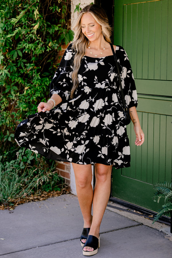 Chic Soul Plus size clothing, Black short baby doll dress with half sleeves, square neckline, and a white floral pattern throughout 
