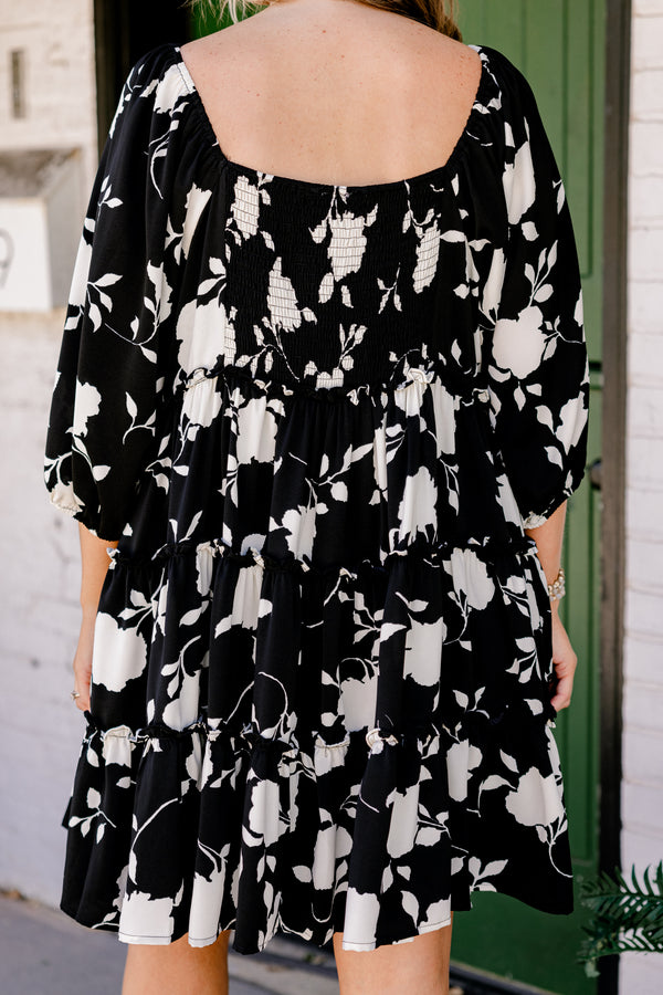 Chic Soul Plus size clothing, Black short baby doll dress with half sleeves, square neckline, and a white floral pattern throughout 

