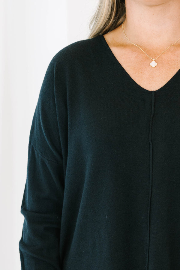 Chic Soul plus size clothing, black sweater with v neckline and textured detail down the center and small slits on the bottom sides