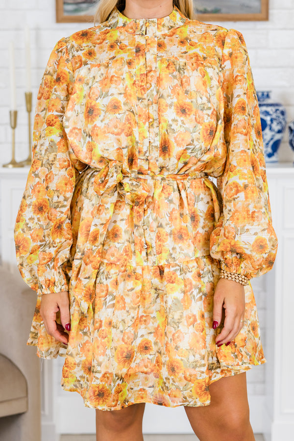 Plus Size amber yellow floral mini dress with a high mock neck, long puff sleeves, and waist sash.