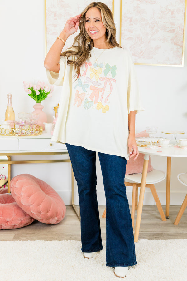Chic Soul plus size clothing, ivory boyfriend tee with multicolor bows in various shapes and sizes