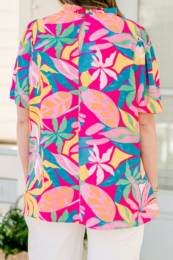 Chic Soul plus size clothing, short-sleeve fuchsia top with a mock neck and an abstract tropical bright multi-colored pattern 