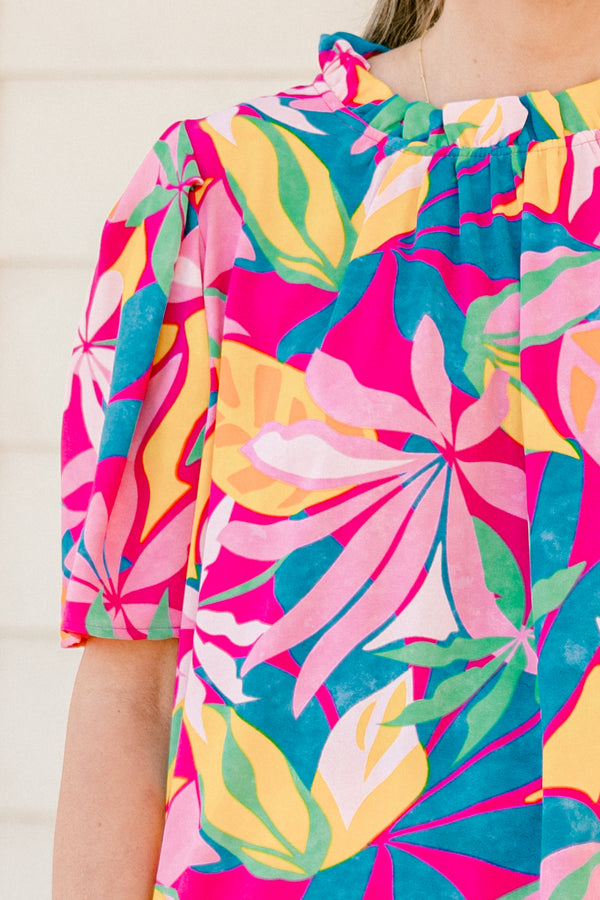 Chic Soul plus size clothing, short-sleeve fuchsia top with a mock neck and an abstract tropical bright multi-colored pattern 