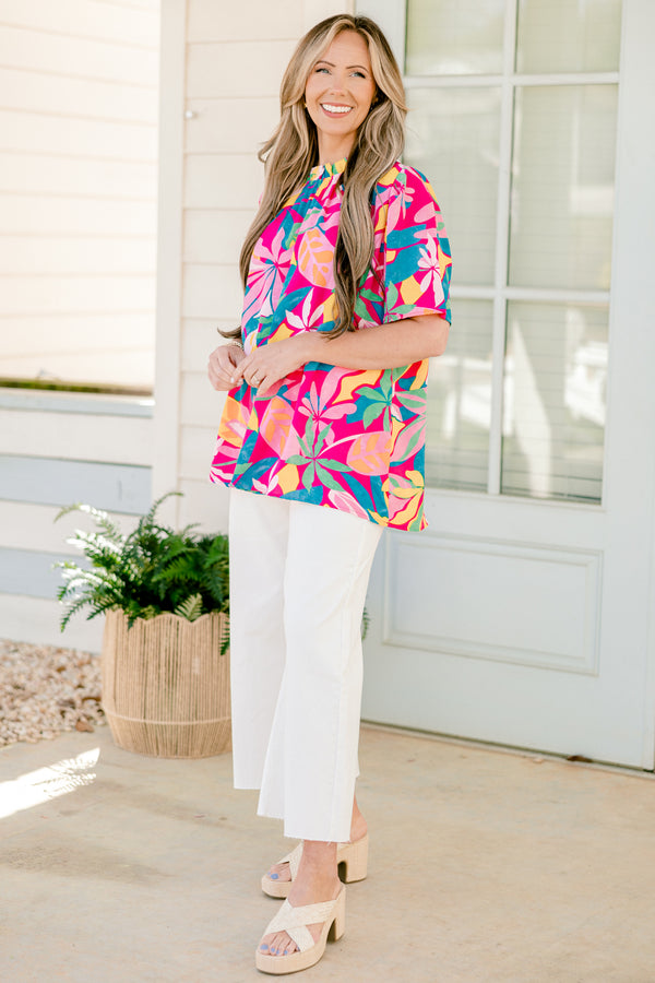 Chic Soul plus size clothing, short-sleeve fuchsia top with a mock neck and an abstract tropical bright multi-colored pattern 