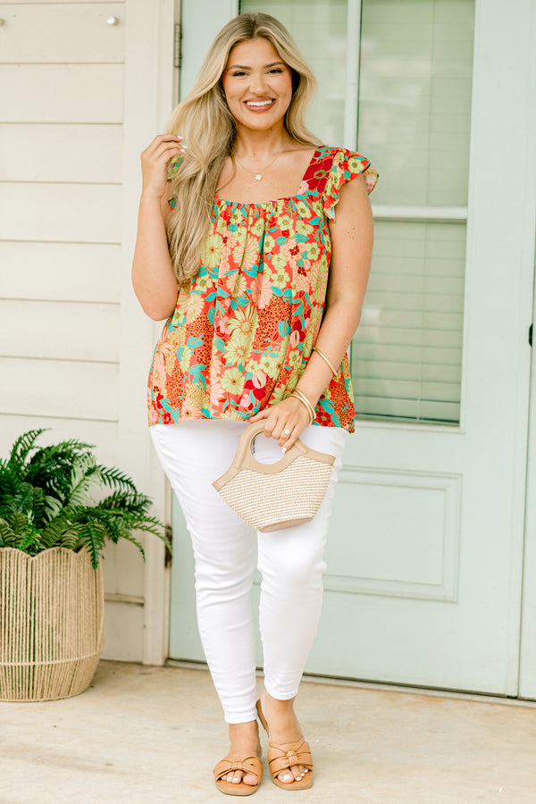 Chic Soul Plus size clothing, pink multi-color top with a floral pattern, square neckline and flutter sleeves 
