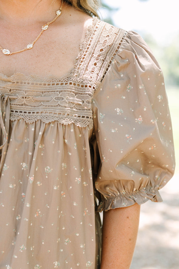 Plus Size brown floral cotton top with lace-trimmed square neckline, tie detail, and puff sleeves.