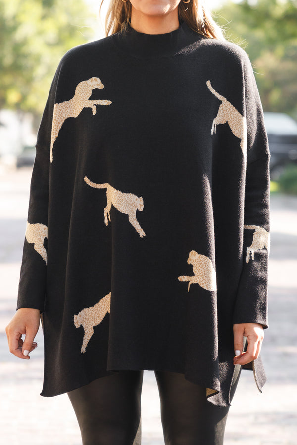 Chic Soul plus size clothing, black oversized sweater with animal prints and slits on the sides