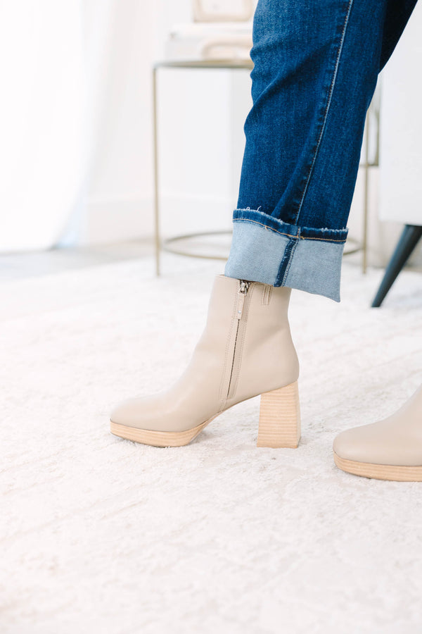 light cream Booties with a wooden block heel and platform.