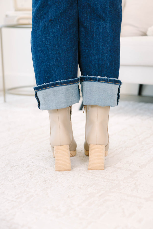 light cream Booties with a wooden block heel and platform.