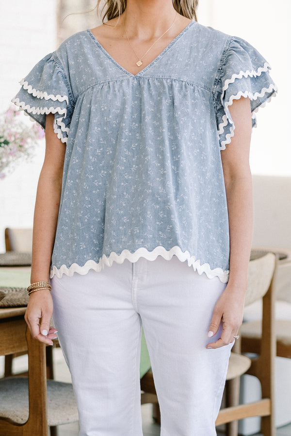 Chic Soul plus size clothing, Blue casual top with a white floral pattern, flutter sleeves