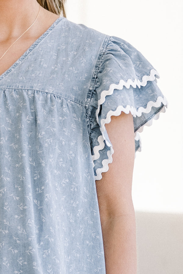 Chic Soul plus size clothing, Blue casual top with a white floral pattern, flutter sleeves