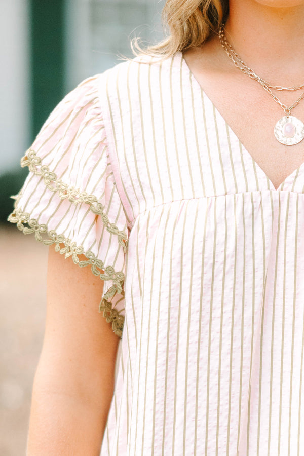 Plus Size light pink striped top with a V-neckline, ruffled sleeves, and olive green lace trim.
