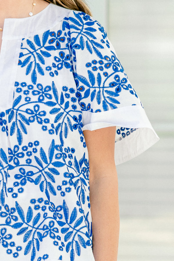 Chic Soul Plus size clothing, off white top with a blue floral pattern and a slight v-neck 
