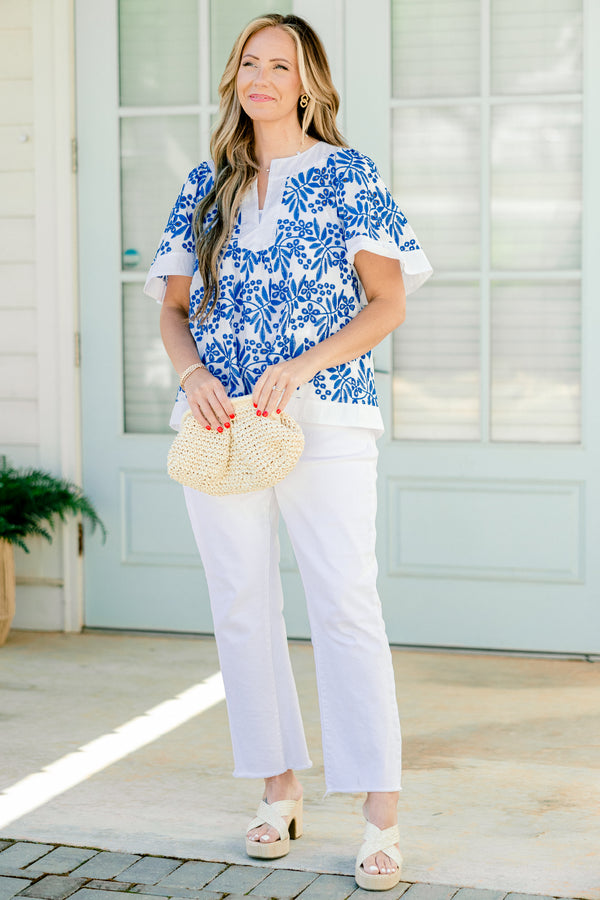 Chic Soul Plus size clothing, off white top with a blue floral pattern and a slight v-neck 
