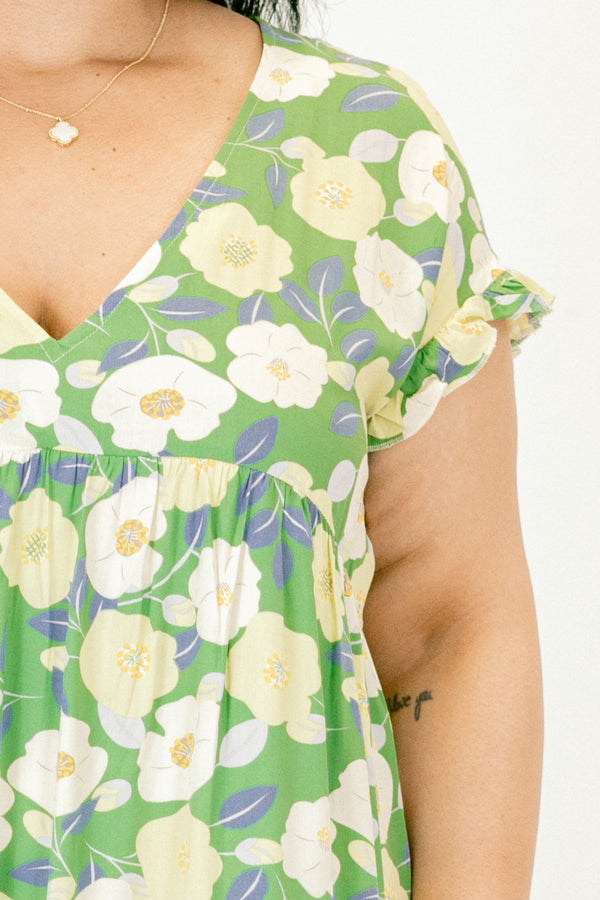 Chic Soul plus size clothing, green babydoll dress with a floral pattern and flutter sleeves