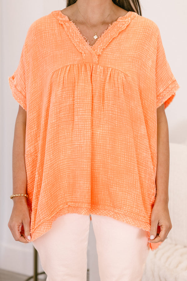 Chic Soul plus size clothing, short-sleeve cuffed pale coral orange mineral washed top with a high-low hemline and a subtle distressed v-neckline