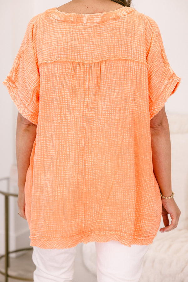 Chic Soul plus size clothing, short-sleeve cuffed pale coral orange mineral washed top with a high-low hemline and a subtle distressed v-neckline