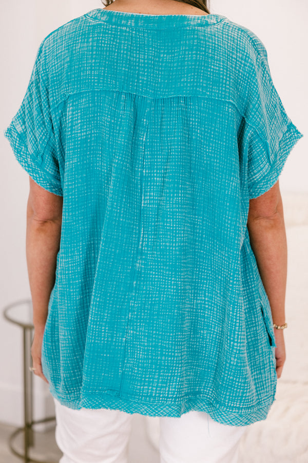 Chic Soul plus size clothing, short-sleeve light teal green mineral wash top with a high-low hemline and a v-neckline with subtle distressing 