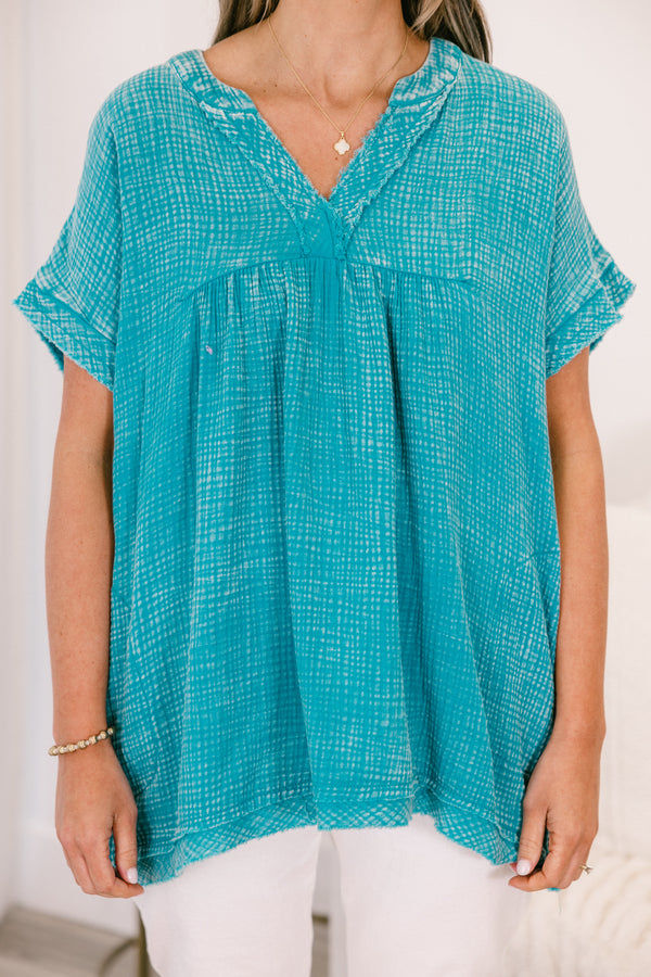 Chic Soul plus size clothing, short-sleeve light teal green mineral wash top with a high-low hemline and a v-neckline with subtle distressing 