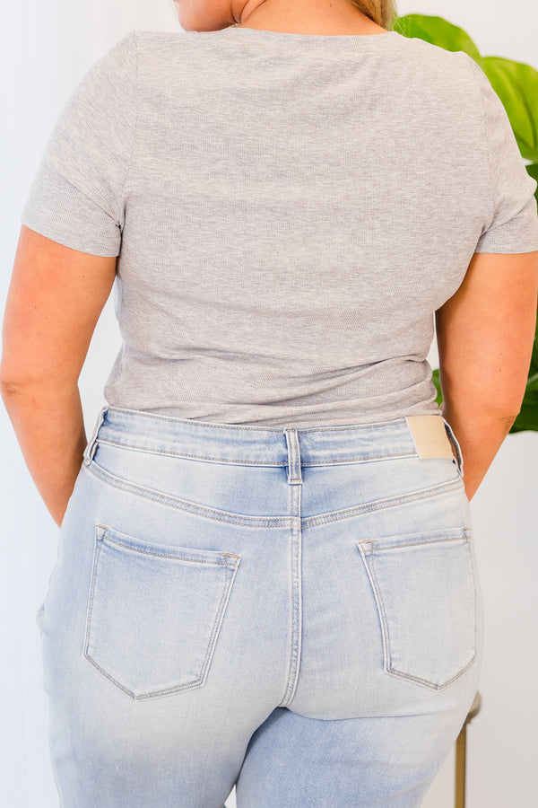 Plus Size heather grey short sleeve bodysuit with a crew neckline and ribbed fabric.