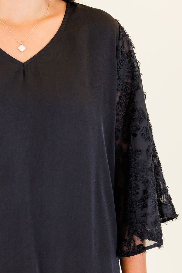 Chic Soul plus size clothing, short-sleeve black top with v-neckline and black lace sleeves with abstract stitching details