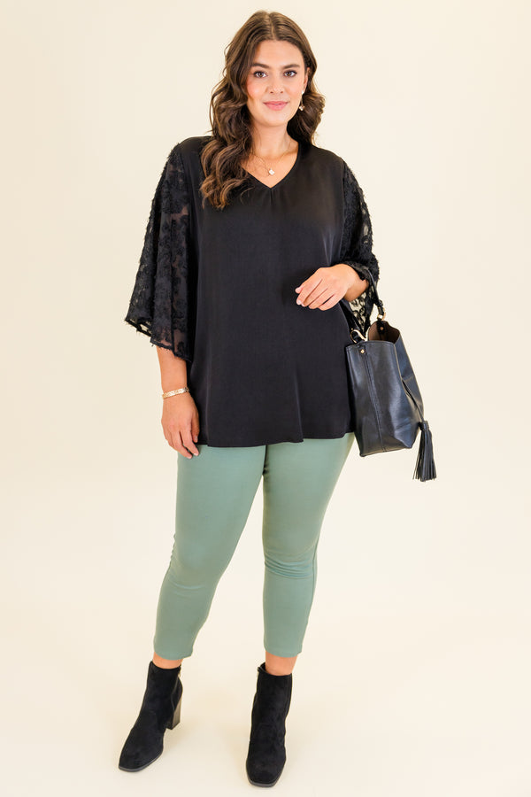Chic Soul plus size clothing, short-sleeve black top with v-neckline and black lace sleeves with abstract stitching details