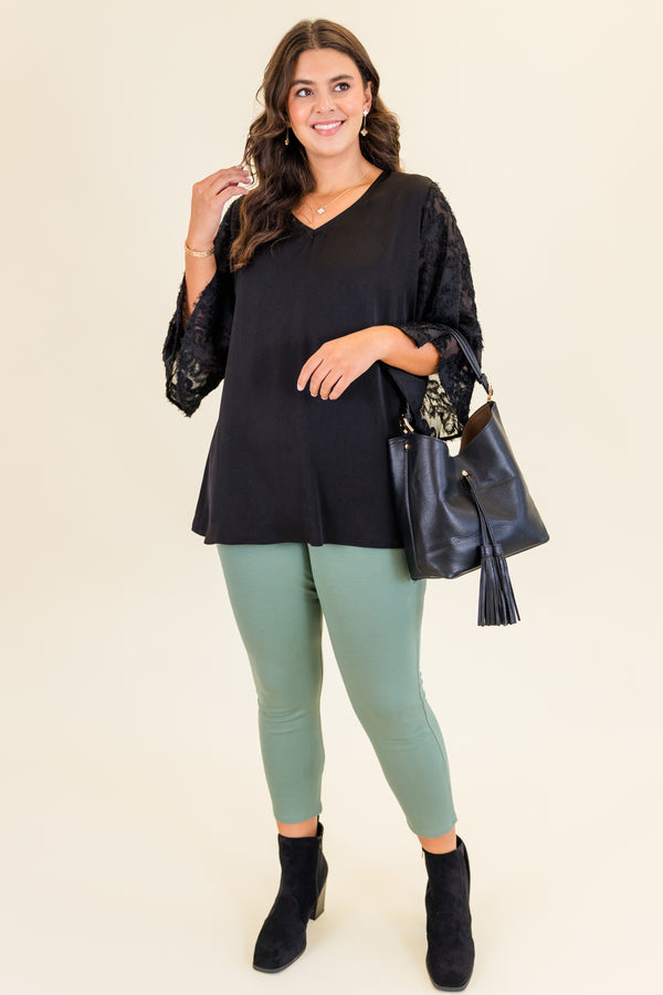 Chic Soul plus size clothing, short-sleeve black top with v-neckline and black lace sleeves with abstract stitching details