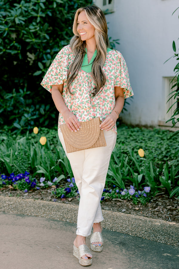 Chic Soul plus size clothing, flowy short sleeve blouse with green v-neck and peach and green floral print