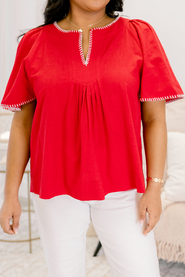 Chic Soul plus size clothing, red short sleeve top that has bell sleeves and white stitching details around the neckline and on the end of the sleeves 