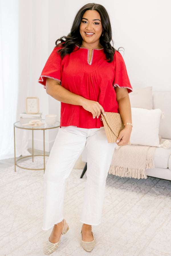 Chic Soul plus size clothing, red short sleeve top that has bell sleeves and white stitching details around the neckline and on the end of the sleeves 