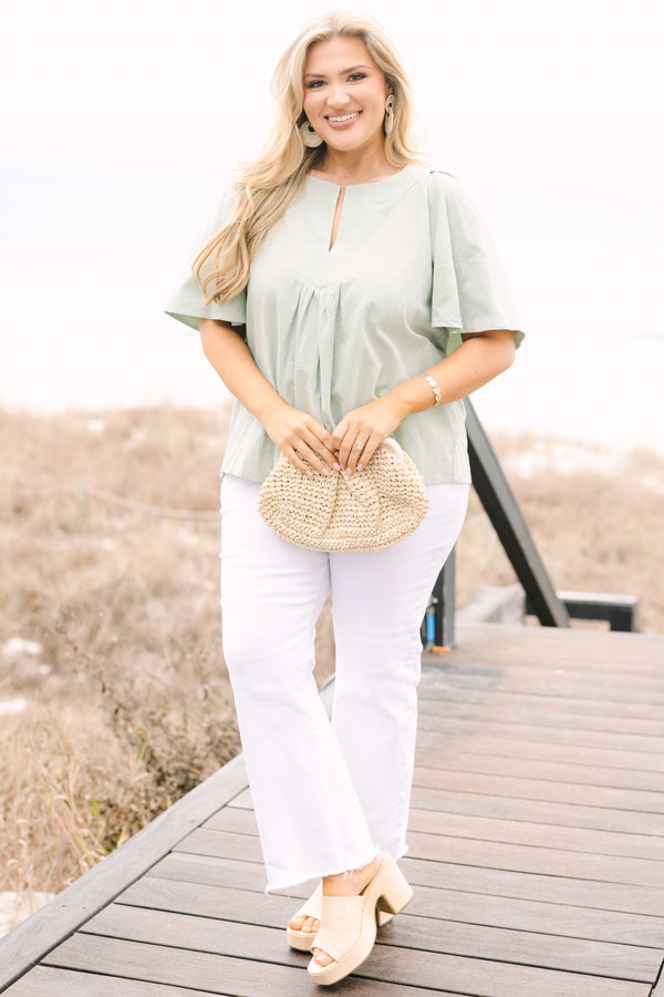 Chic Soul plus size clothing, sage top with short bell sleeves a slight v-neckline and ruching under the center of the chest 
