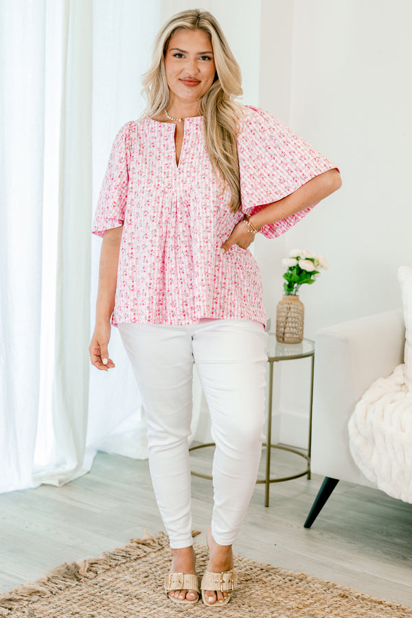 Chic Soul plus size clothing, pink short sleeve top with a floral pattern and flowy sleeves 