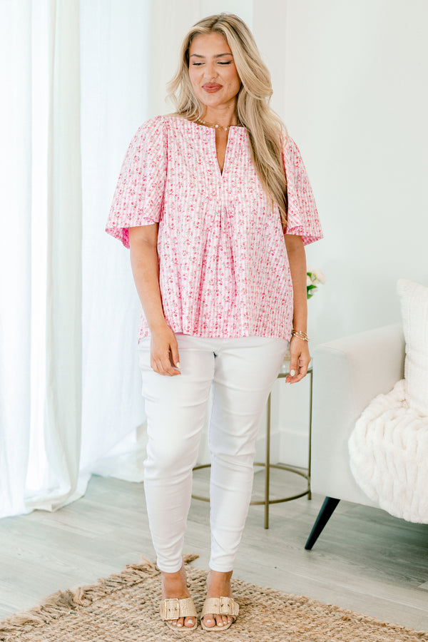 Chic Soul plus size clothing, pink short sleeve top with a floral pattern and flowy sleeves 