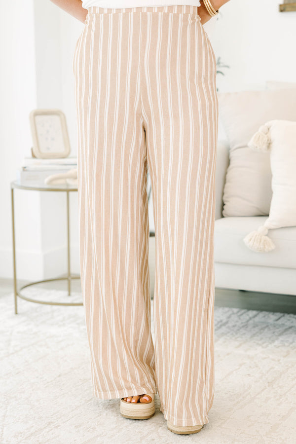 Plus Size khaki and off-white vertical striped wide-leg pants with a relaxed fit.