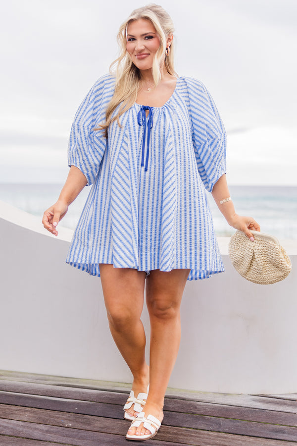 Chic Soul plus size clothing, blue and white abstract stripe flowy romper with puff sleeves and dark blue tie at the chest