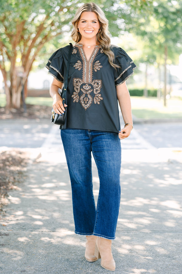Plus Size black top with leopard print embroidery, V-neckline, and tiered flutter sleeves.