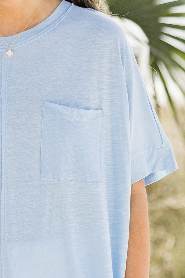 Plus Size light blue short sleeve cotton top with a front pocket and center seam detail.