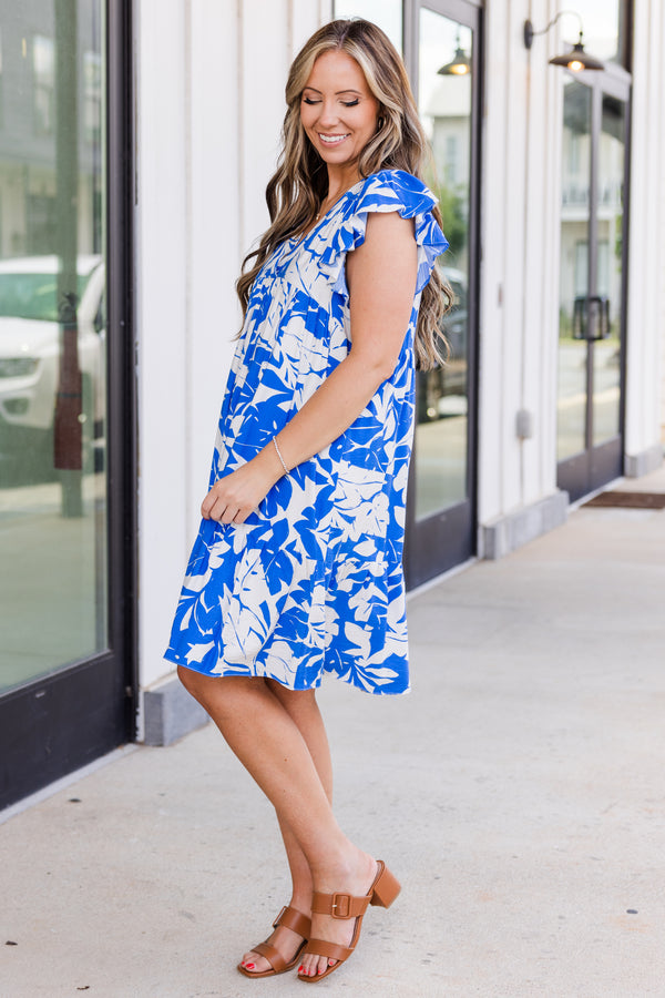 Chic Soul plus size clothing, flutter-sleeve royal blue and off-white baby doll dress with v-neckline and tropical floral pattern