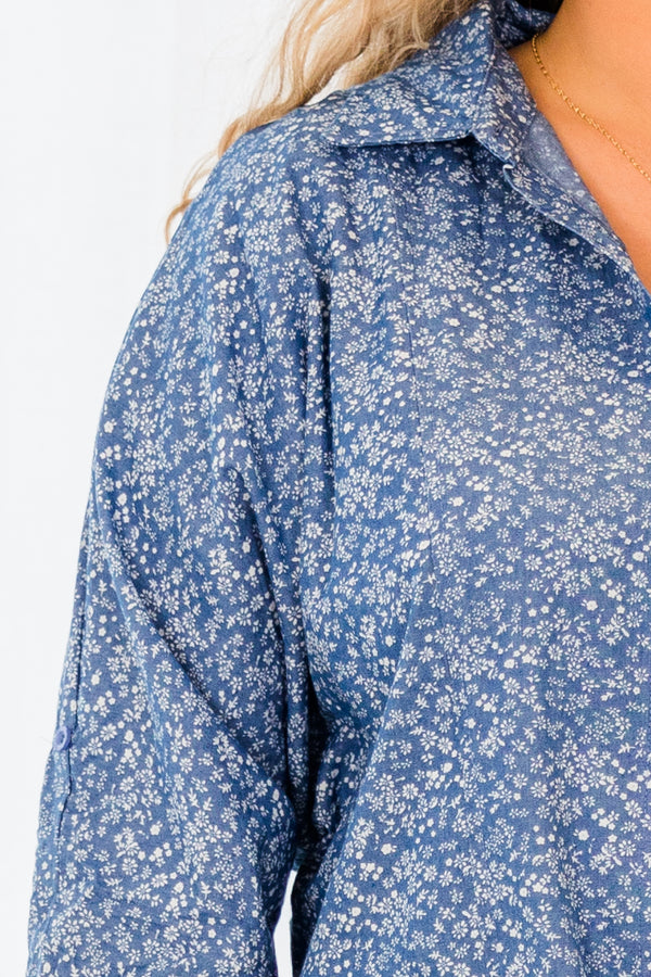 Chic Soul plus size clothing, denim long sleeve button up top with tie detail at the bottom with small white floral detail