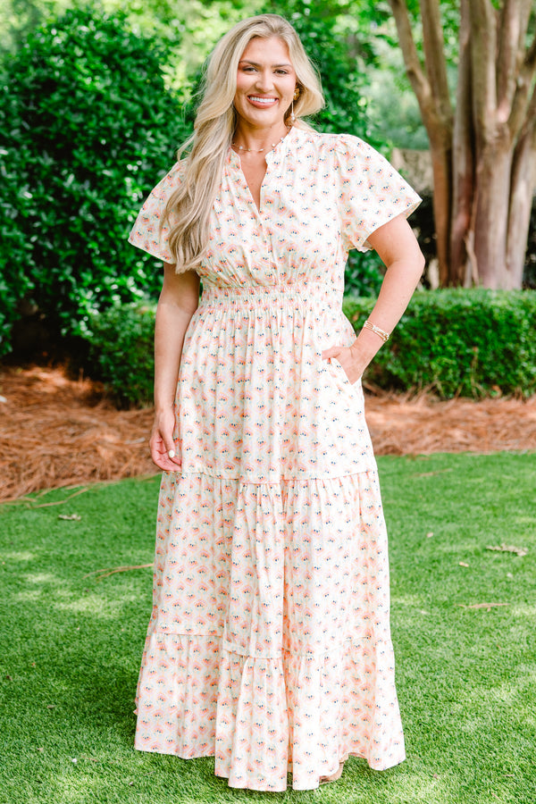Chic Soul plus size clothing, short sleeve cream maxi dress with V-neck and subtle pink and turquoise abstract pattern