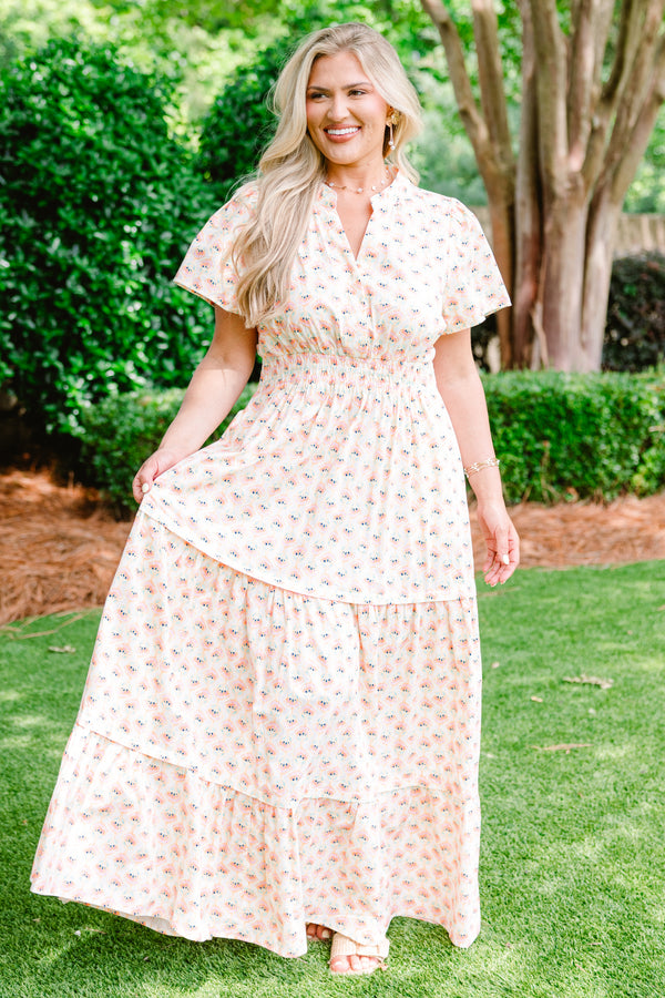 Chic Soul plus size clothing, short sleeve cream maxi dress with V-neck and subtle pink and turquoise abstract pattern